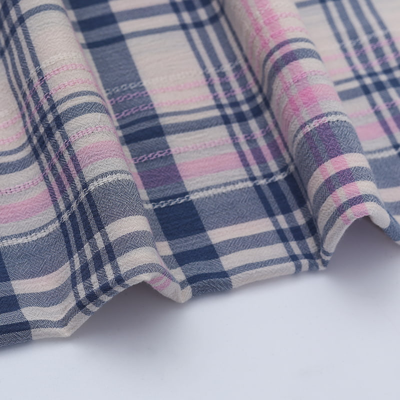 Esplorazione della versatilità dei tessuti per fodere adesivi e in maglia di ordito